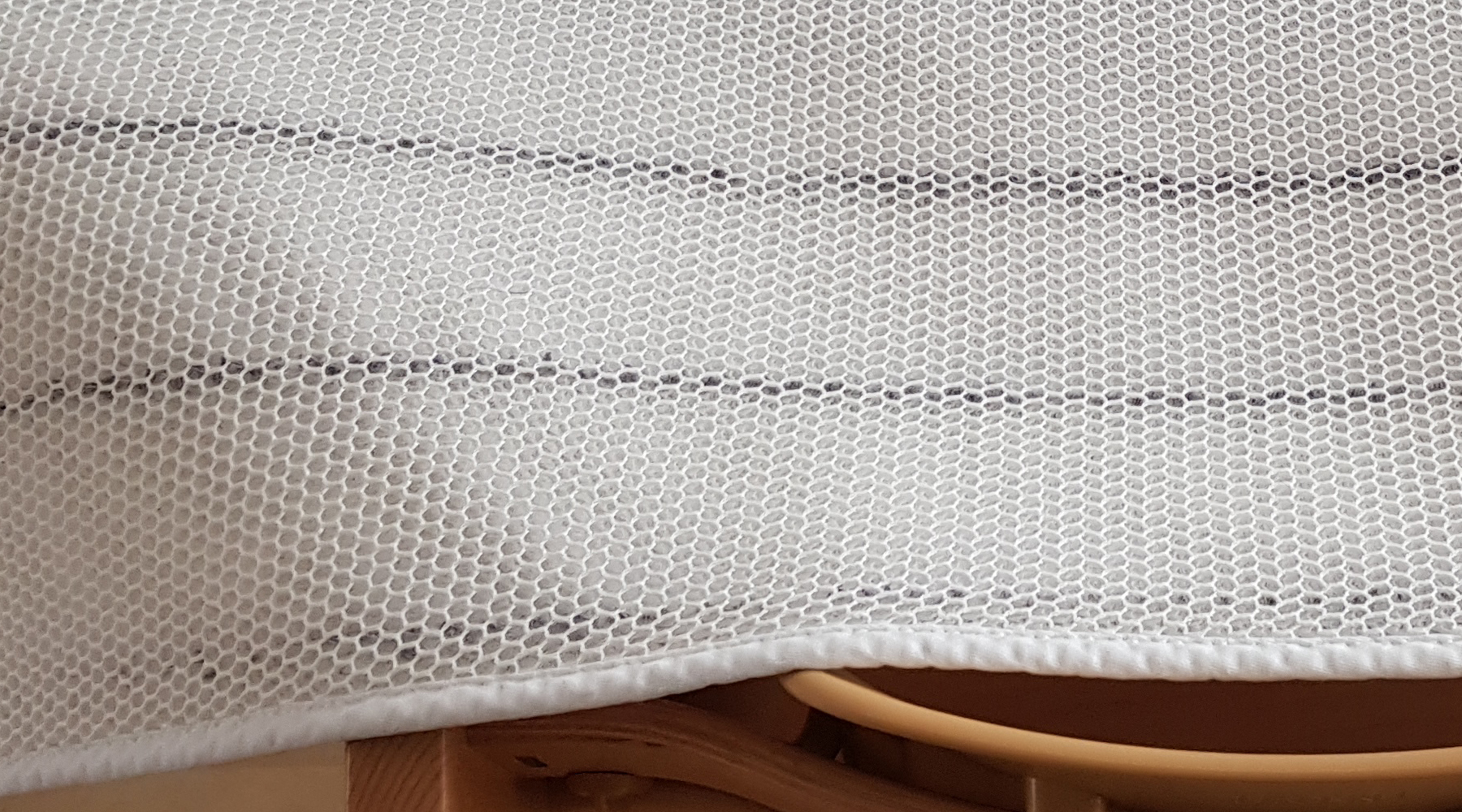 Textieldeeltjes_in_matrasbeschermer.jpg